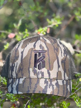 Load image into Gallery viewer, KT Team Mossy Oak Bottomland Short Bill Hat w/KT Team Logo
